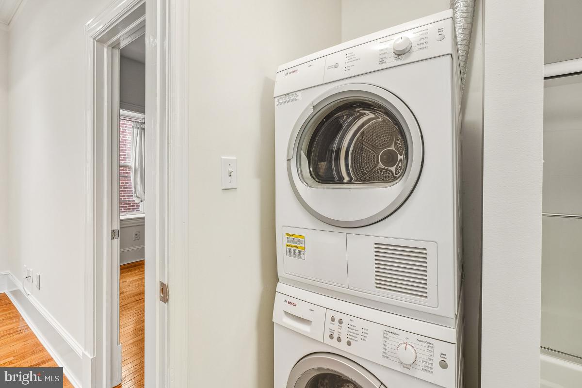 1807 California Street Northwest, Unit 305 Washington, DC 20009 - Photo 23 of 30 a close up view of a washer and dryer