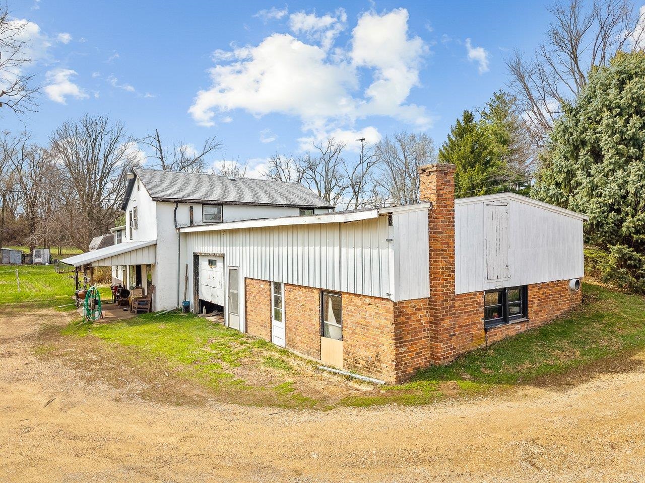 2280 South Rock City Road Ridott, IL 61067 - Photo 56 of 59 a view of a house with a yard