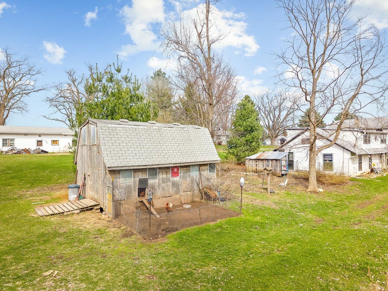 2280 South Rock City Road Ridott, IL 61067 - Photo 59 of 59 a view of a garden with a slide