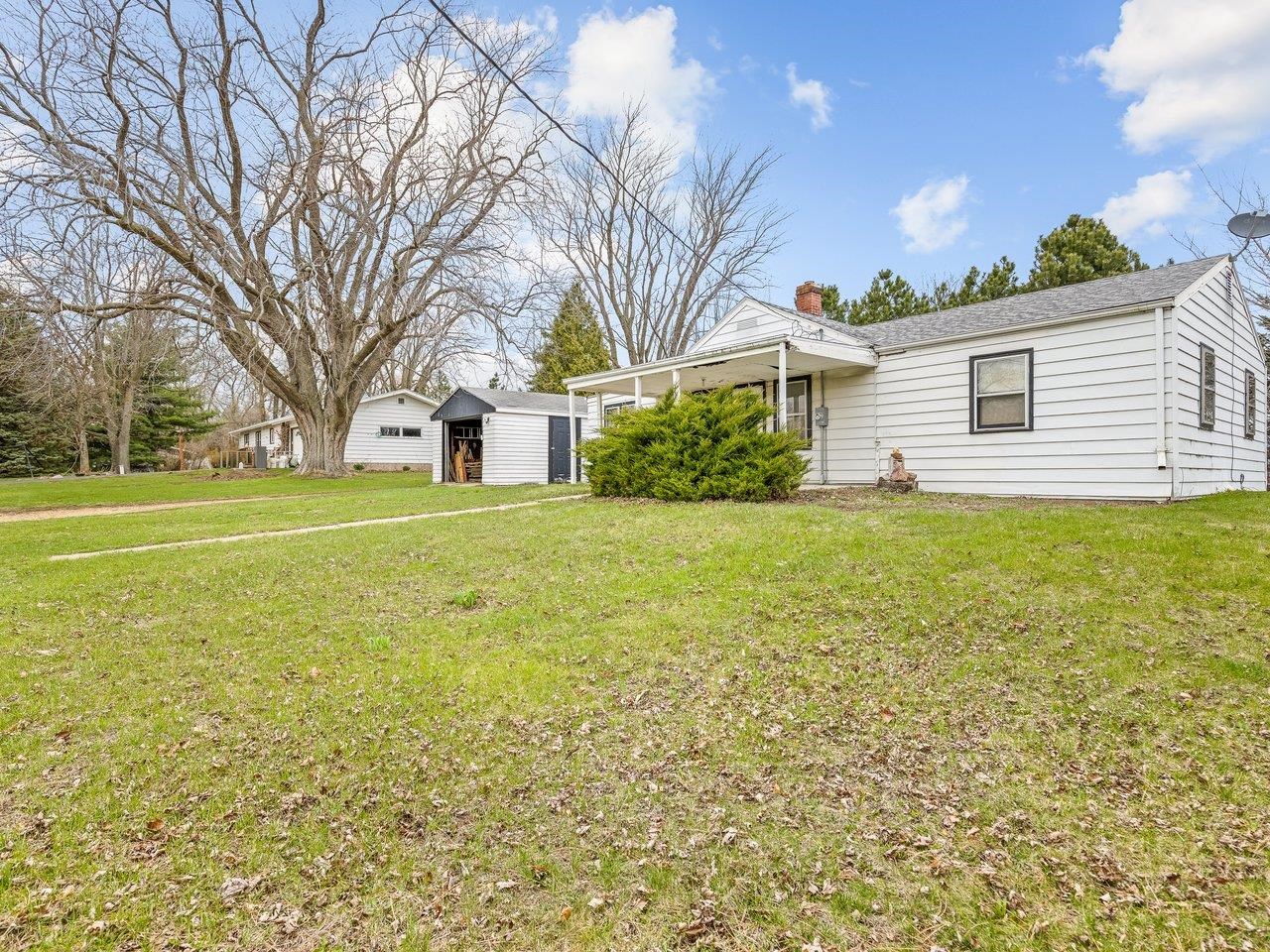 2280 South Rock City Road Ridott, IL 61067 - Photo 7 of 59 a view of a house with a yard