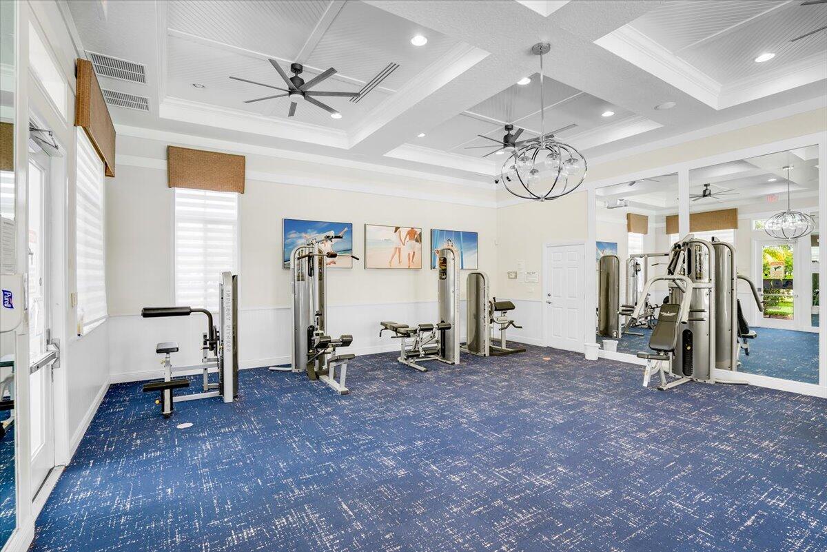 6013 Pine Tree Way Riviera Beach, FL 33410 - Photo 27 of 33 a view of a livingroom with furniture and a ceiling fan