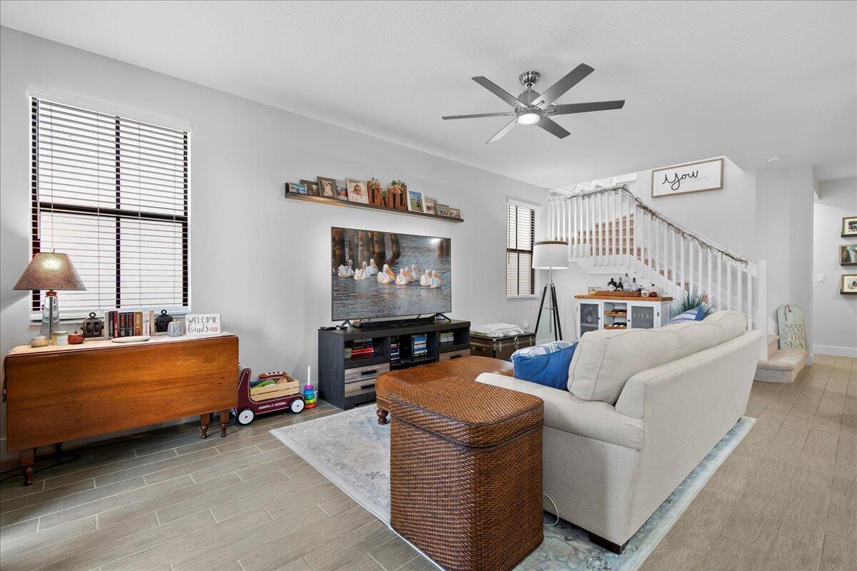 6013 Pine Tree Way Riviera Beach, FL 33410 - Photo 10 of 33 a living room with furniture and a window