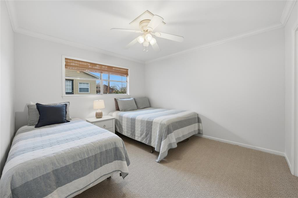 111 Ridgeoak Way Tool, TX 75143 - Photo 11 of 21 a bedroom with two beds and a chandelier