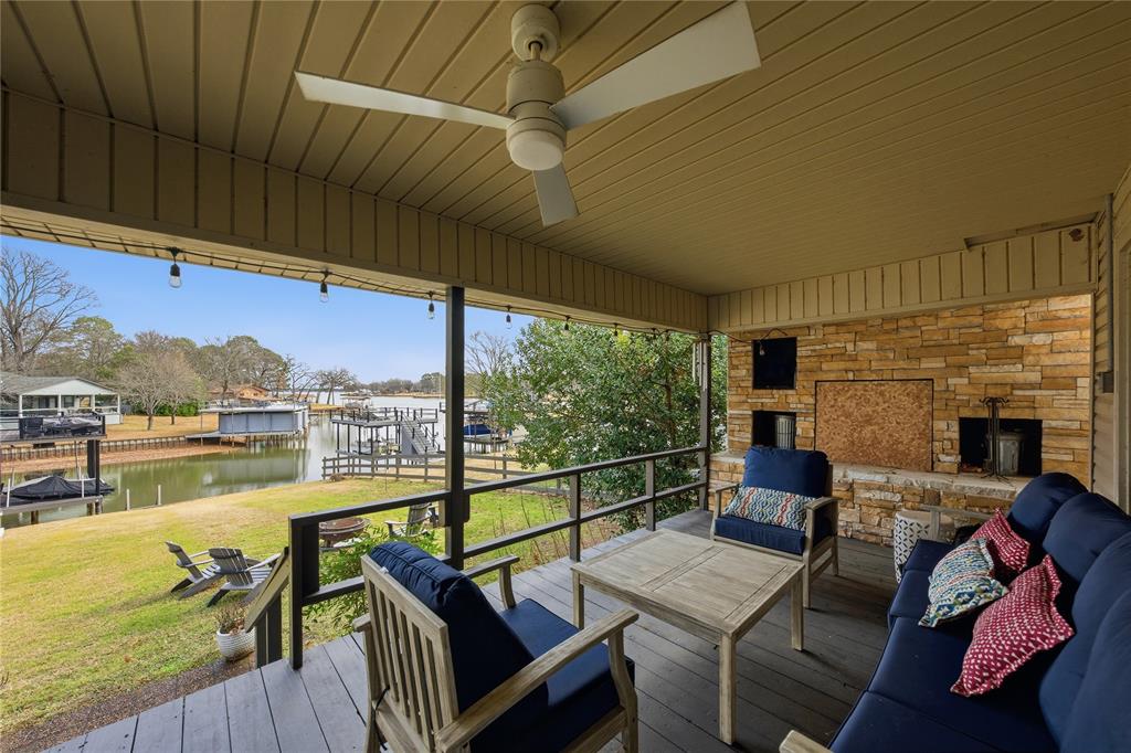 111 Ridgeoak Way Tool, TX 75143 - Photo 16 of 21 a balcony with furniture and a fireplace