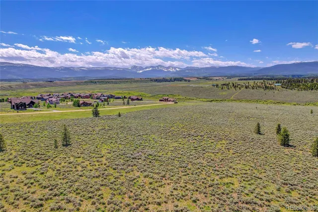 a view of an ocean and city