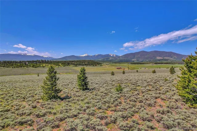a view of a lake with sunset