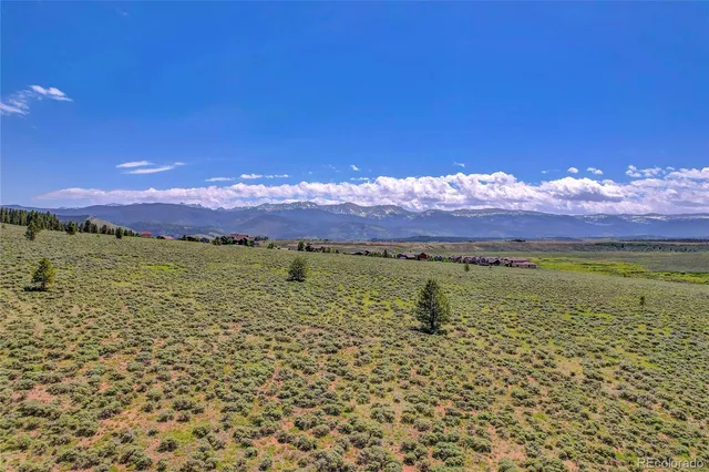 a view of a city with an ocean