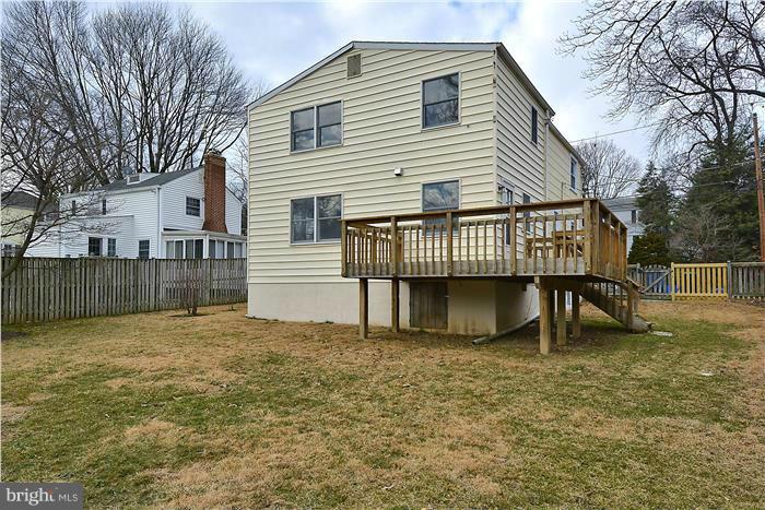 318 Whitestone Road Silver Spring, MD 20901 - Photo 2 of 28 a view of backyard with a deck and a large tree