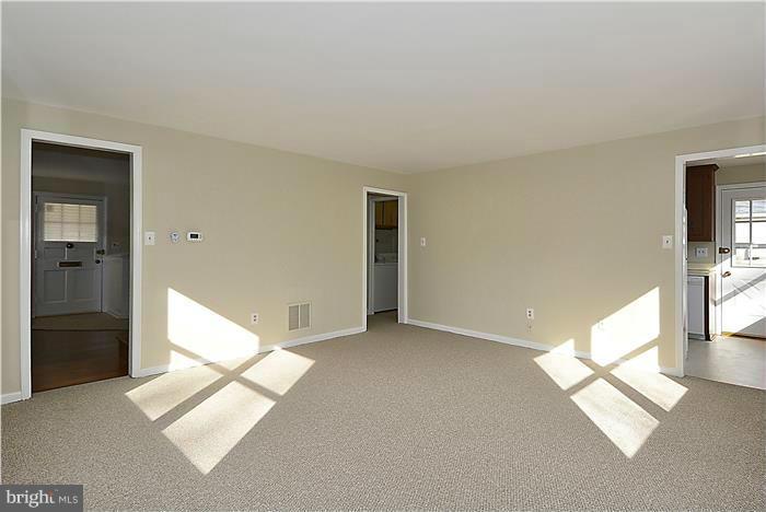 318 Whitestone Road Silver Spring, MD 20901 - Photo 23 of 28 a view of empty room with floor to ceiling window