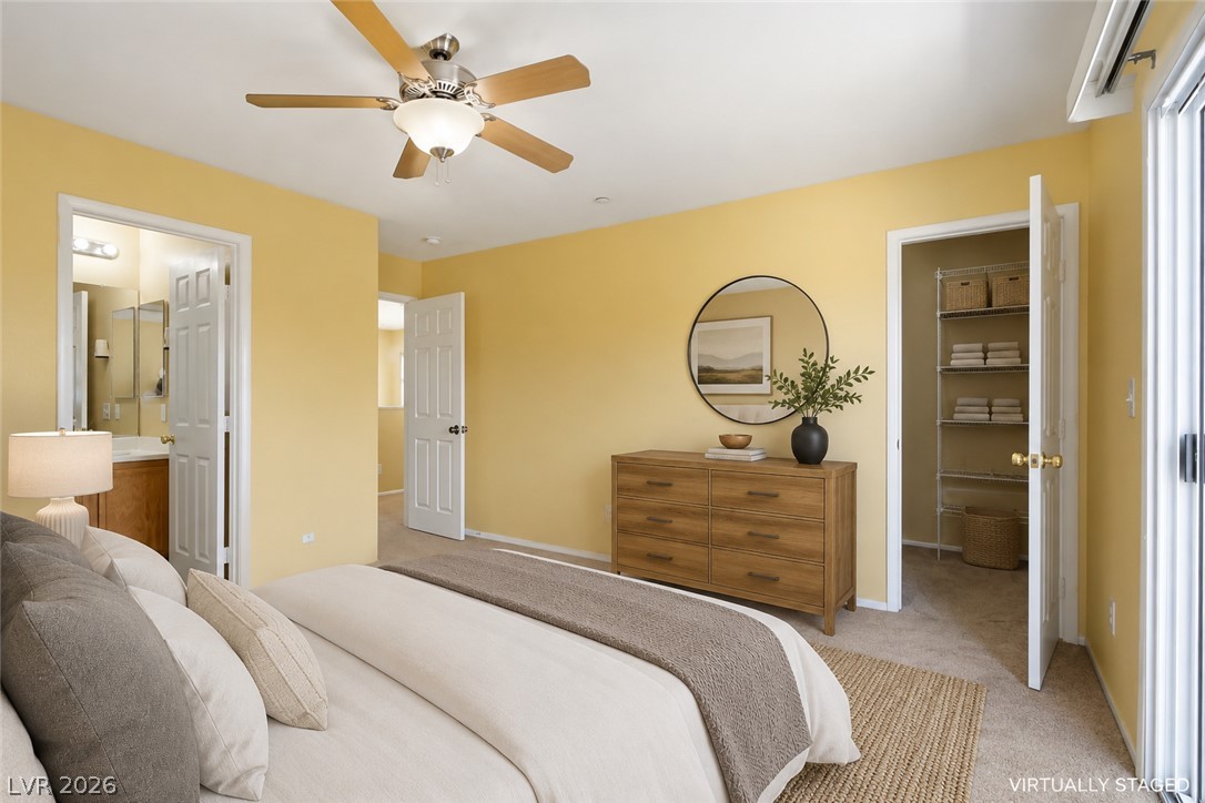 1172 Gecko Road Henderson, NV 89002 - Photo 12 of 30 Primary Bedroom has a beautiful patio with mountain views. Virtually staged to showcase the potential of this home!