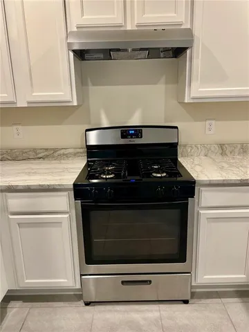a view of entry way with wooden floor