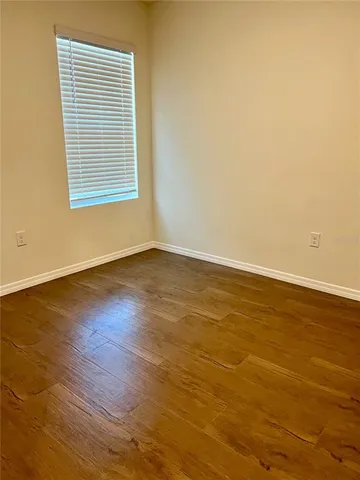 a bathroom with a bathtub and a toilet
