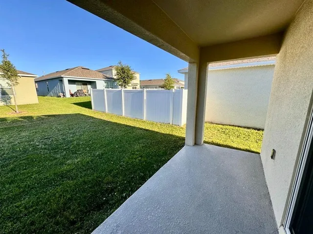 a view of porch and yard