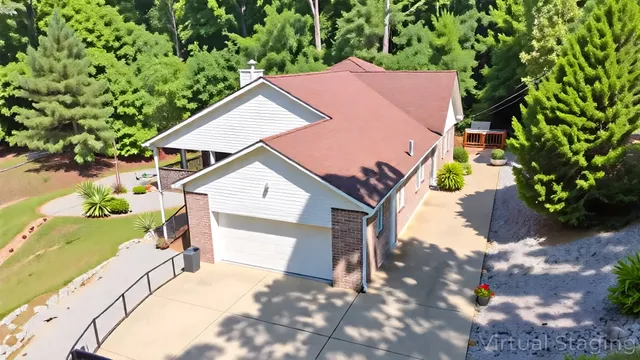 a view of a patio with table and chairs and potted plants