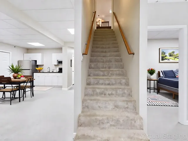 an aerial view of residential house with outdoor space and lake view