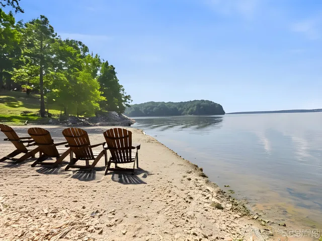 a bedroom with a bed and a wall painting