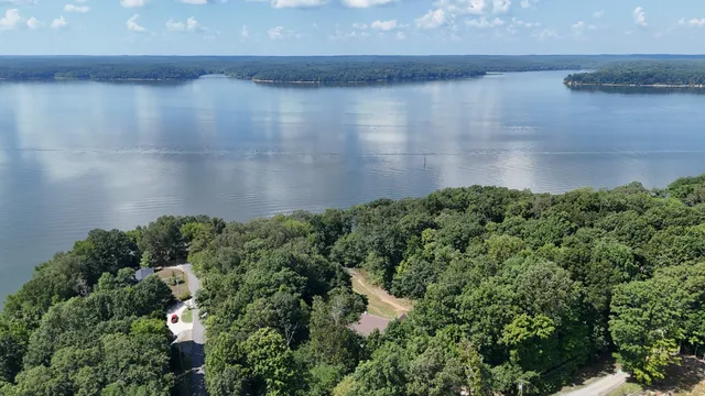 a view of a swimming pool with an outdoor space and seating area