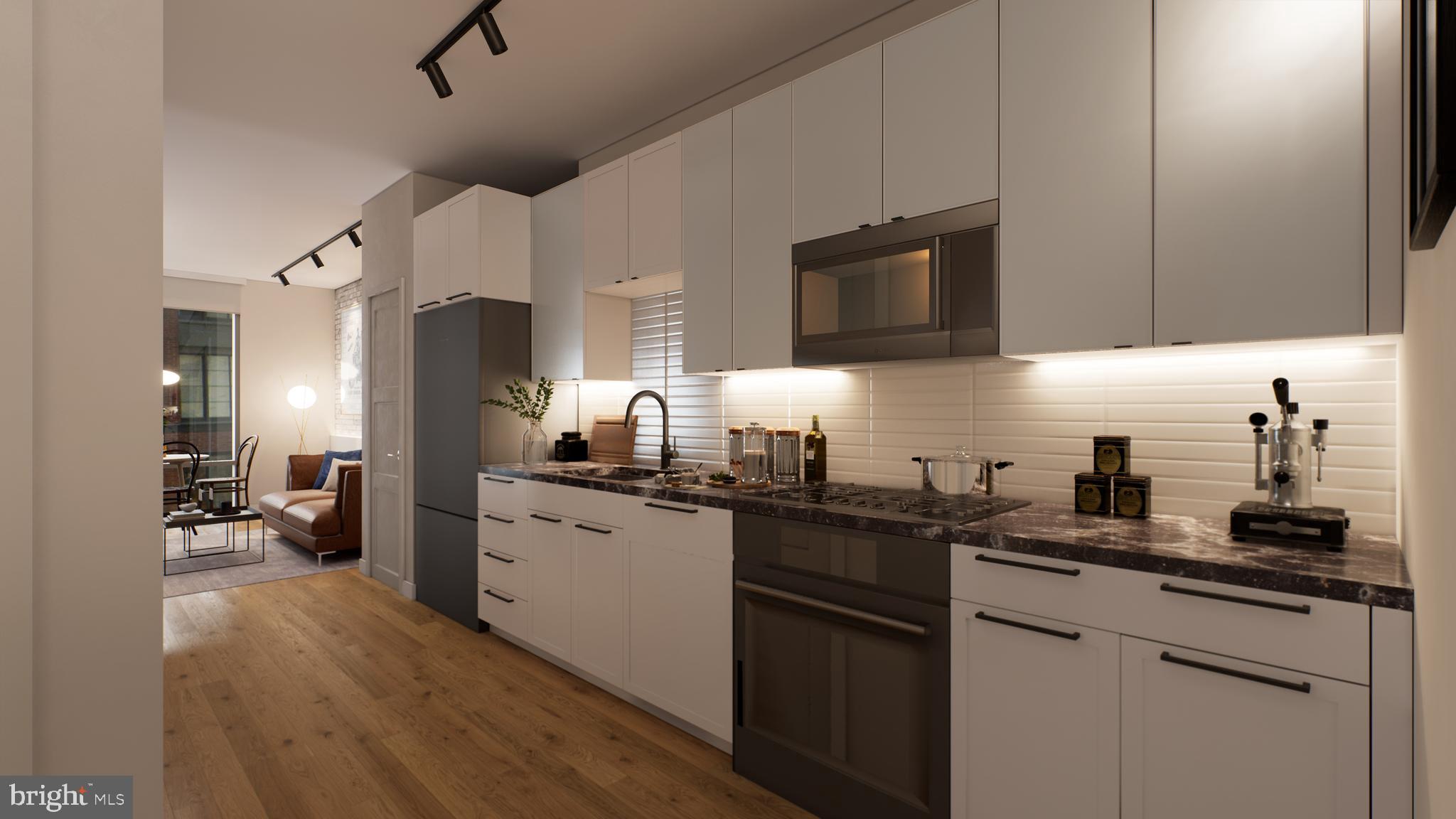 70 N Street Southeast, Unit 314 Washington, DC 20003 - Photo 4 of 12 Gloss white cabinets, silestone top, ss appliances