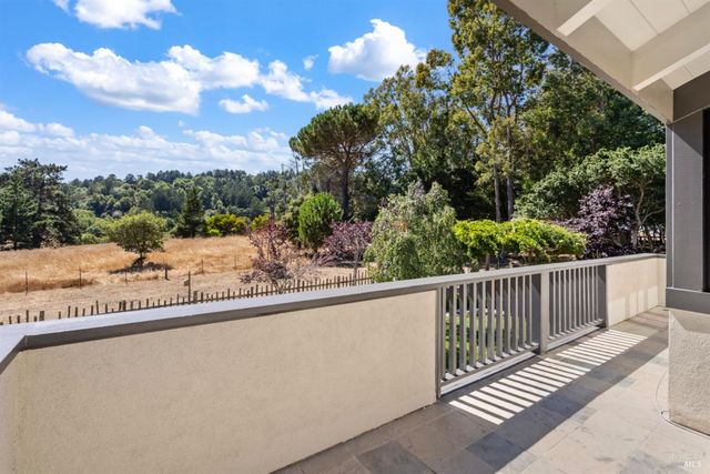 a view of a terrace with a bench