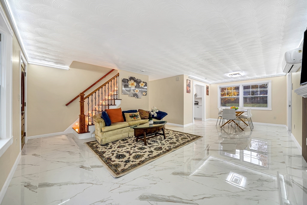 9 Donna Road Chelmsford, MA 01824 - Photo 1 of 37 a living room with furniture and wooden floor