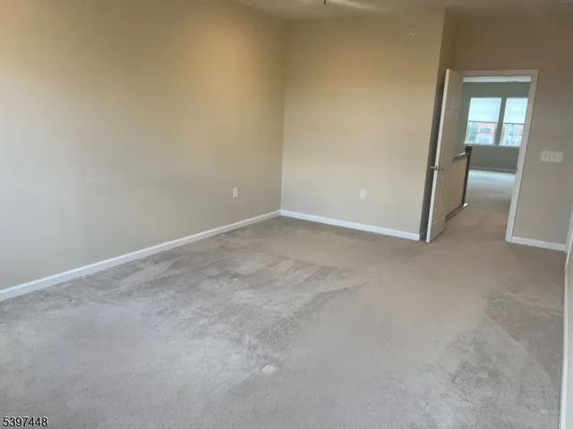 an empty room with a bathroom