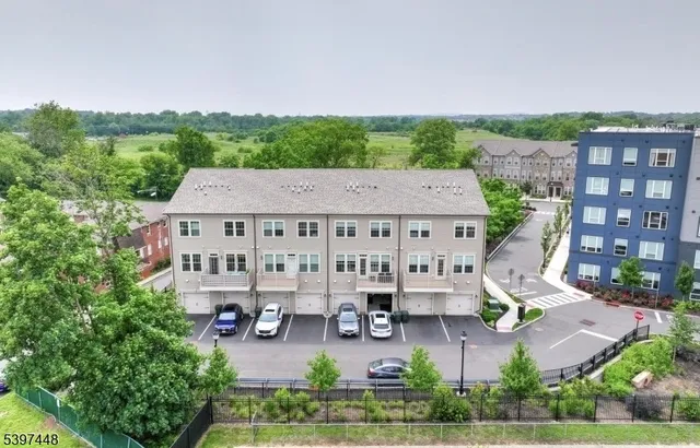 aerial view of a house with outdoor space and sitting area