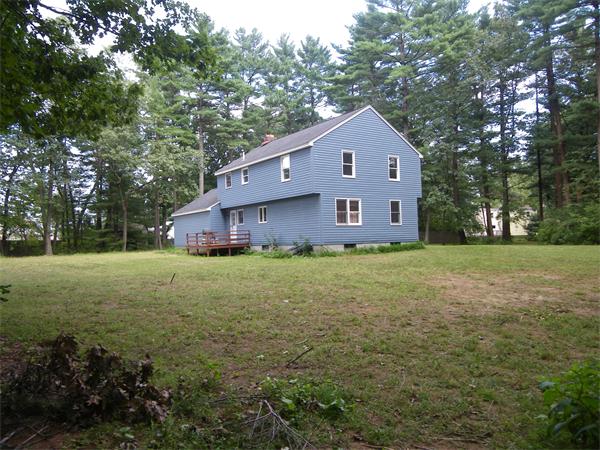 127 Patten Road Tewksbury, MA 01876 - Photo 12 of 16 a house view with a outdoor space