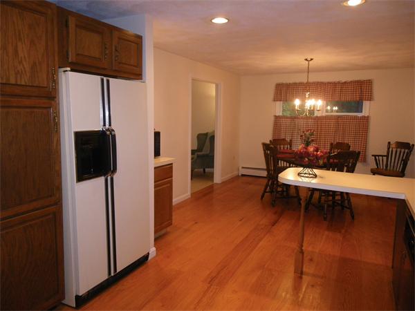 127 Patten Road Tewksbury, MA 01876 - Photo 5 of 16 a living room with furniture and a wooden floor