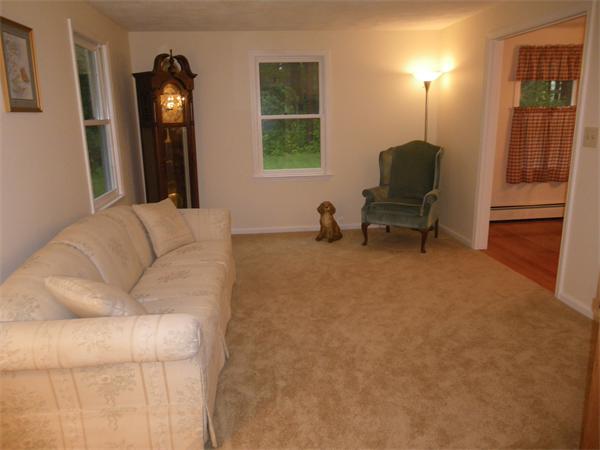 127 Patten Road Tewksbury, MA 01876 - Photo 8 of 16 a living room with furniture and a window