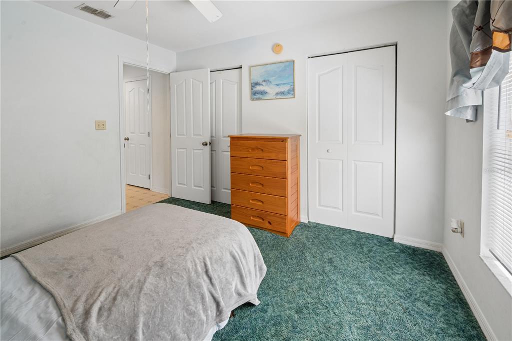 1750 Southwest 15th Street Bell, FL 32619 - Photo 19 of 34 a bedroom with a bed and a window