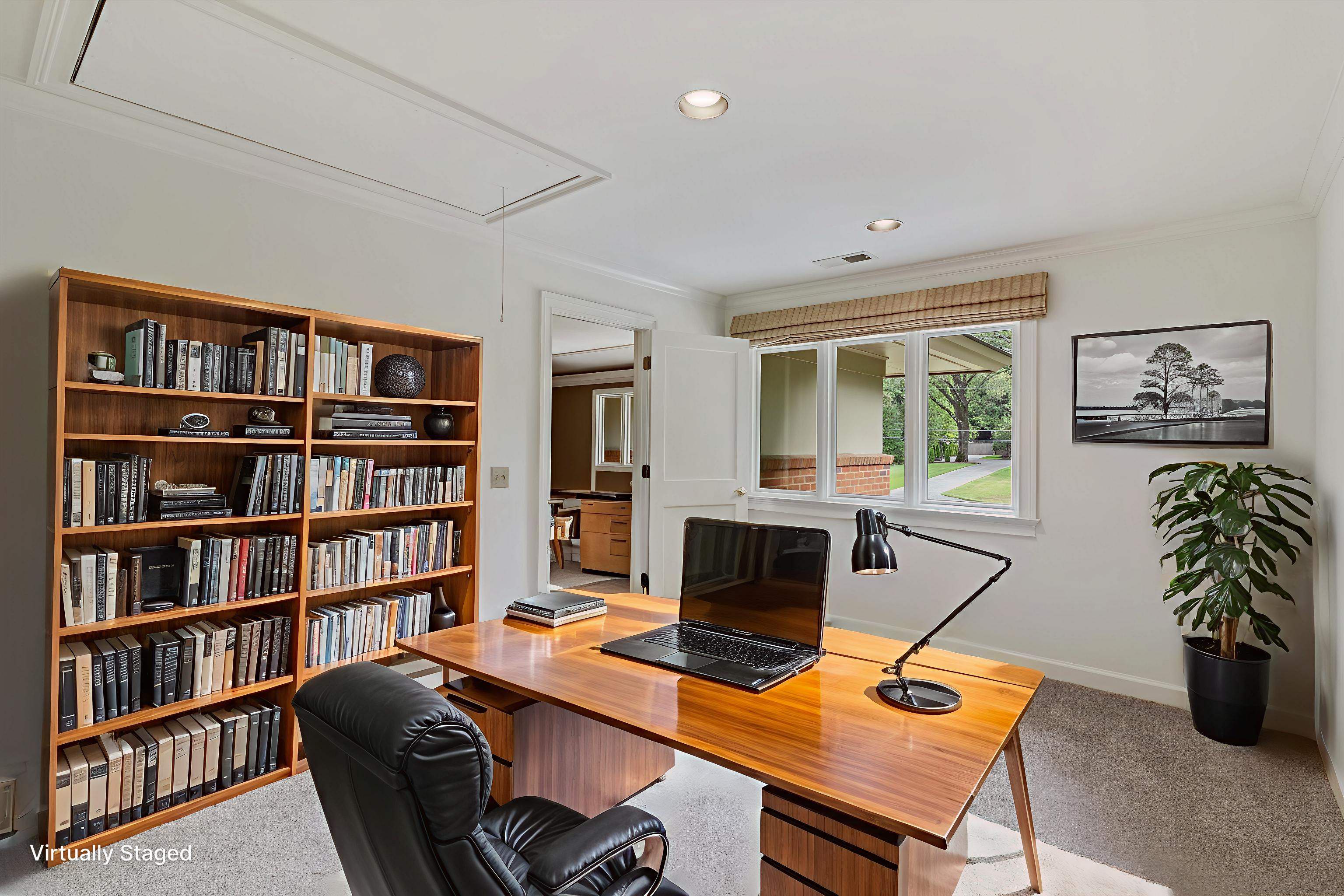 4501 Minden Road Memphis, TN 38117 - Photo 17 of 25 a view of a workspace with a bookshelf