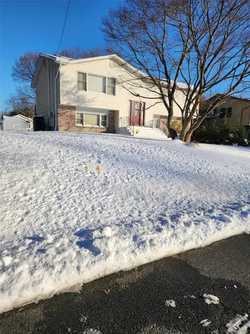 a view of a house with a snow