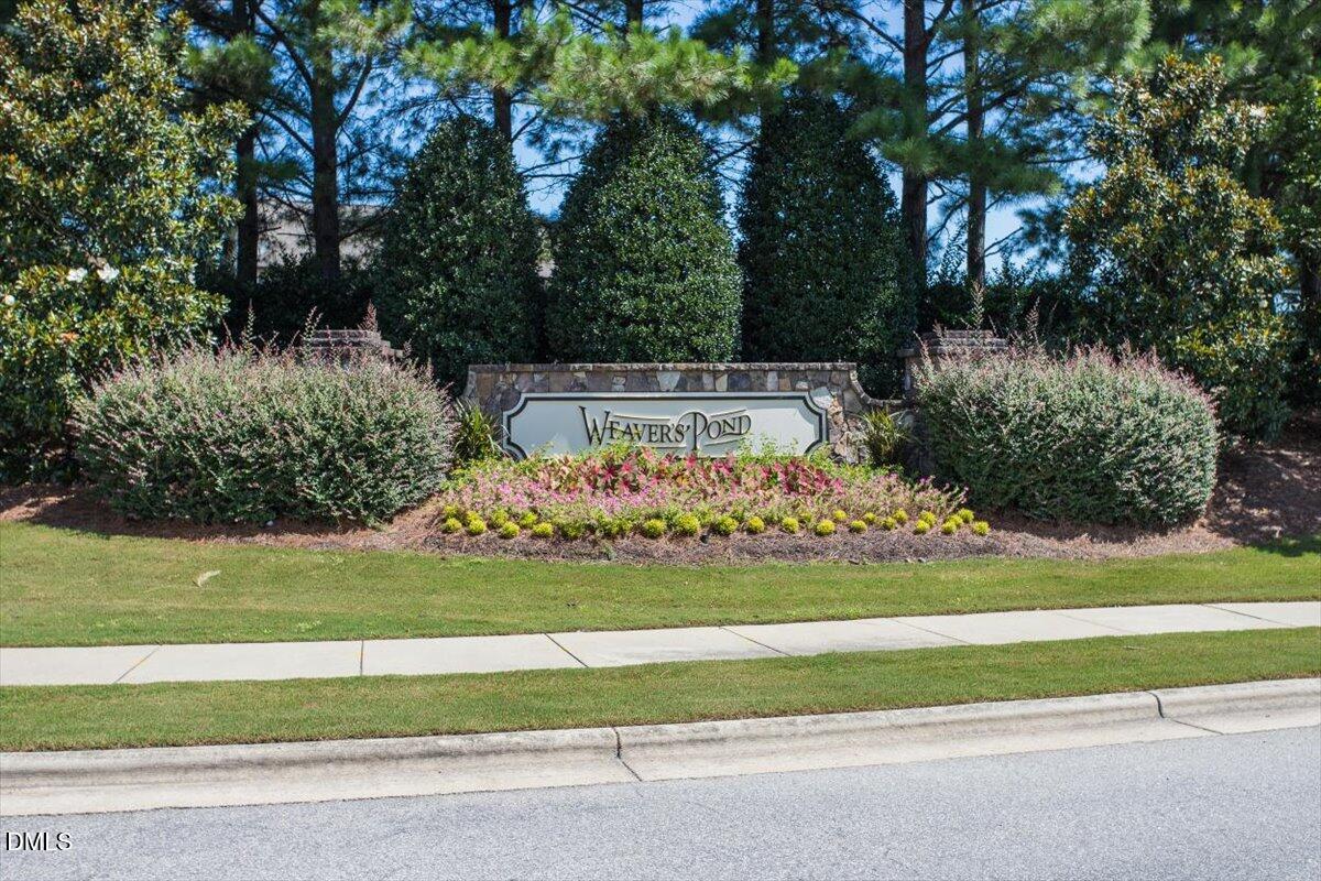 4222 Vineyard Ridge Drive Zebulon, NC 27597 - Photo 29 of 39 a view of a garden and basketball court