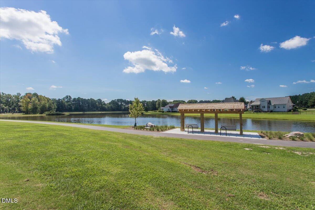 4222 Vineyard Ridge Drive Zebulon, NC 27597 - Photo 30 of 39 a view of a house with a big yard