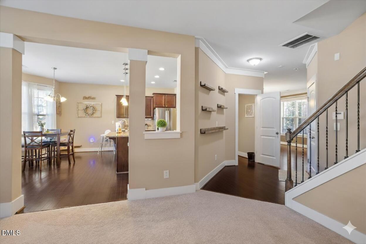 4222 Vineyard Ridge Drive Zebulon, NC 27597 - Photo 8 of 39 a view of a living room and dining room