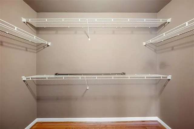 a view of a room with racks on the wall