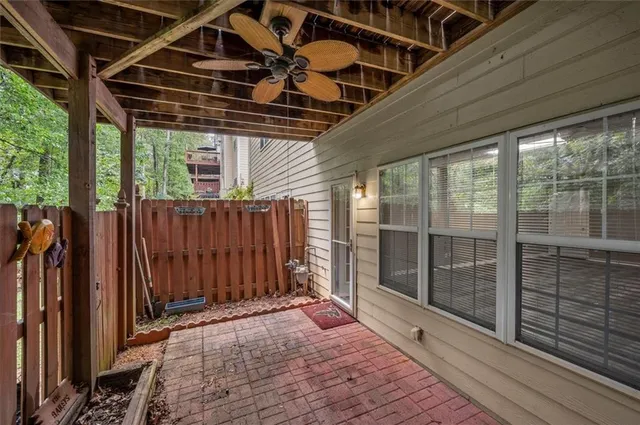 a view of a house with sitting area and swimming pool