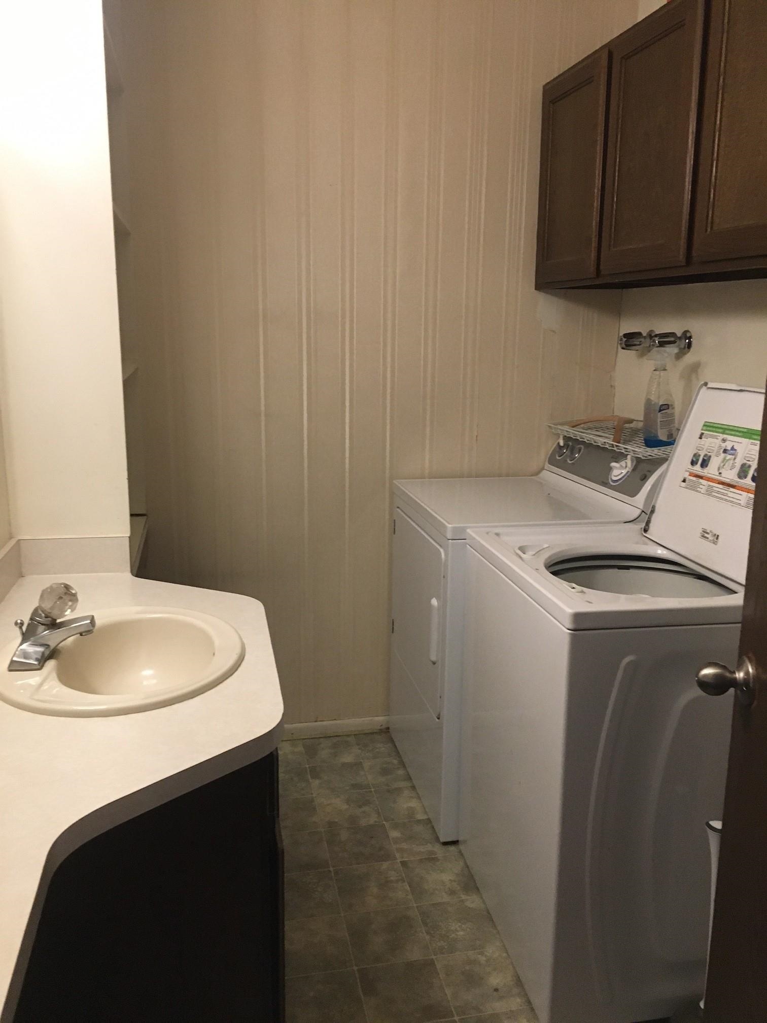 555-28 28 1/2 Road, Unit 11 Grand Junction, CO 81501 - Photo 6 of 12 a utility room with sink dryer and washer