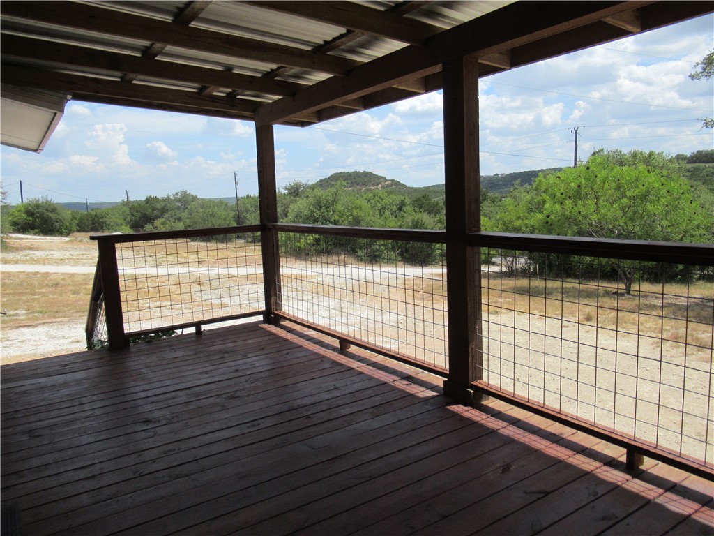 10620 D Deer Canyon Road, Unit D Jonestown, TX 78645 - Photo 20 of 22 Covered deck with Webb Mountain in distance