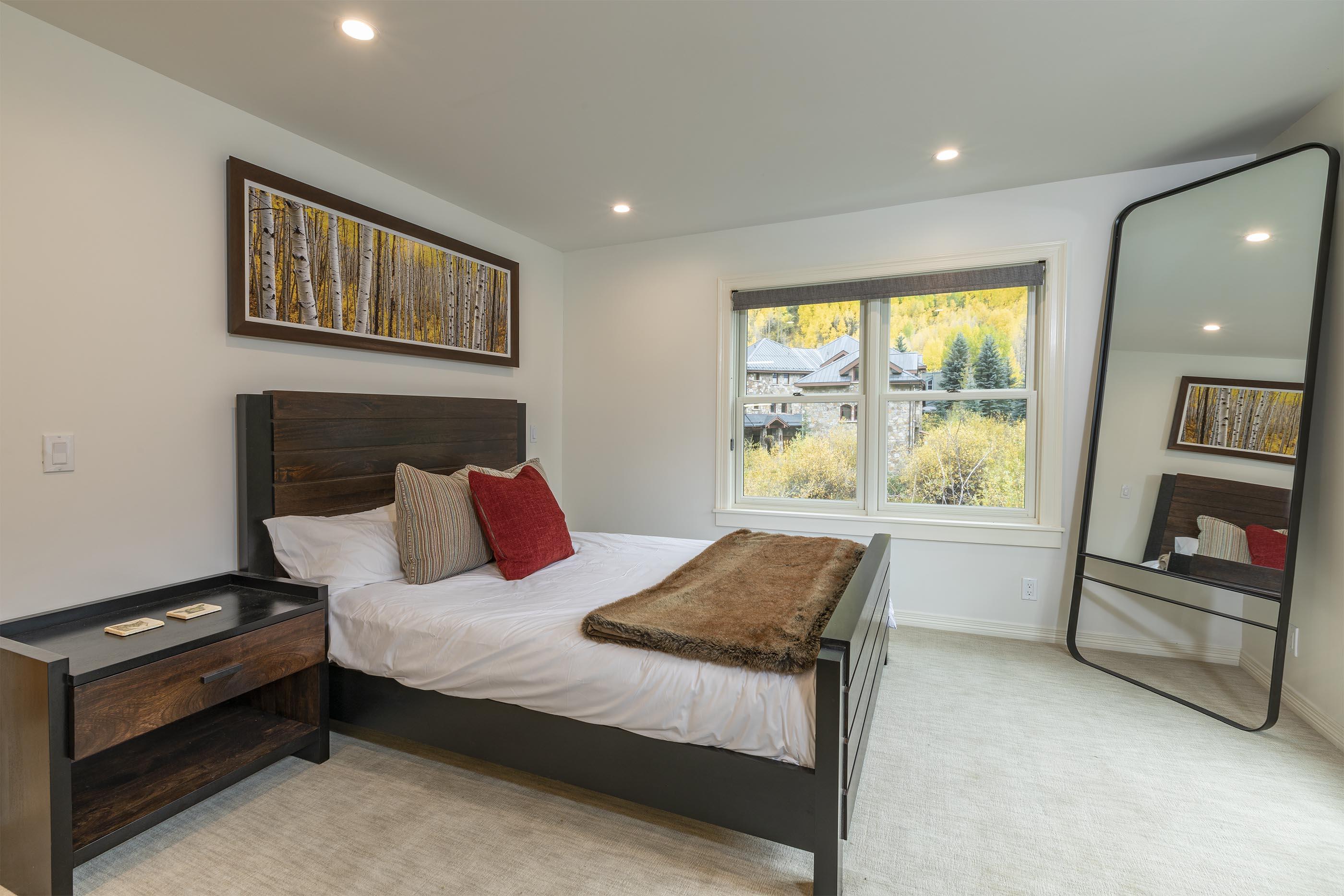 259 South Spruce Street, Unit BC Telluride, CO 81435 - Photo 15 of 28 a bedroom with a bed and a large window