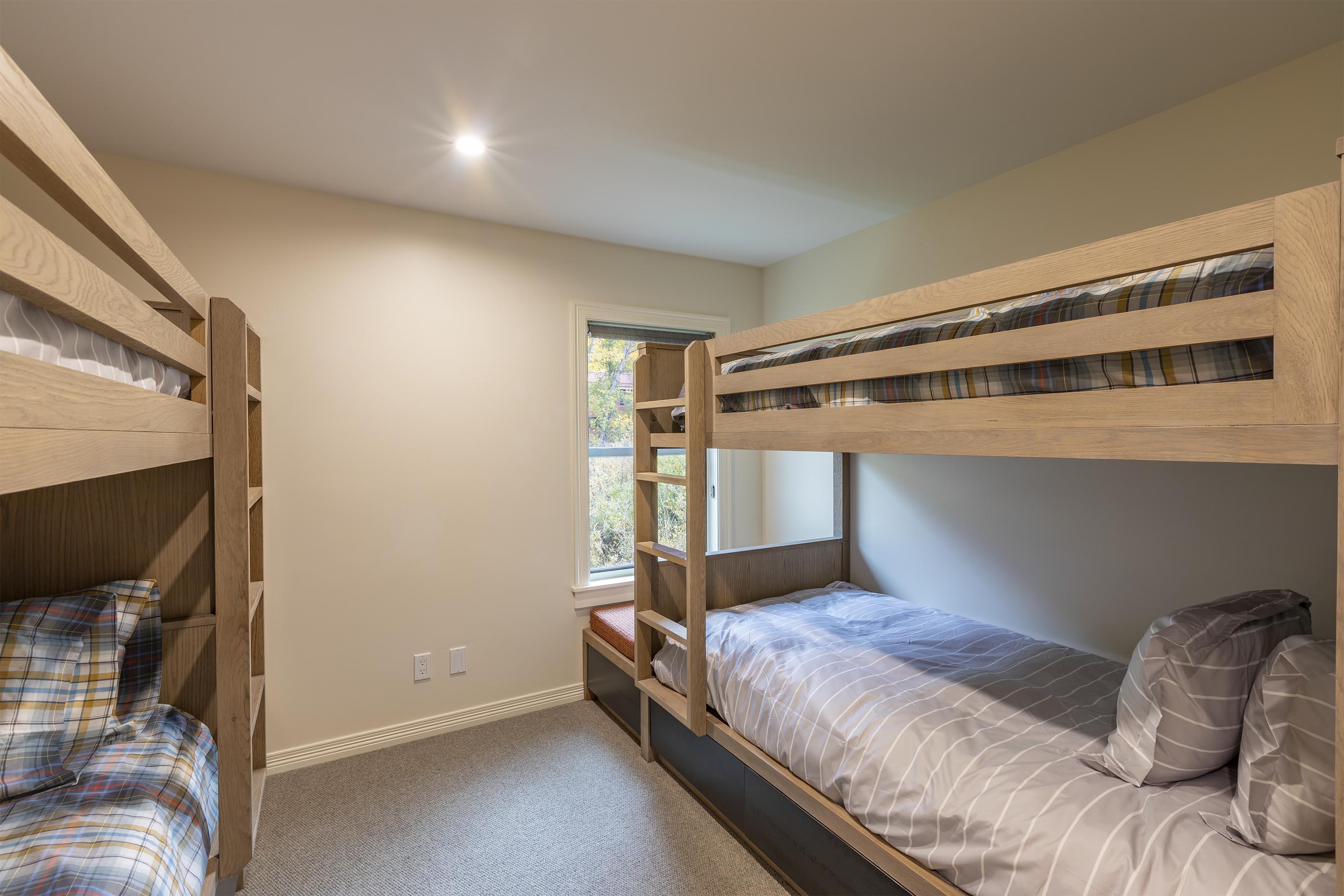 259 South Spruce Street, Unit BC Telluride, CO 81435 - Photo 19 of 28 a bedroom with a bed and a mirror