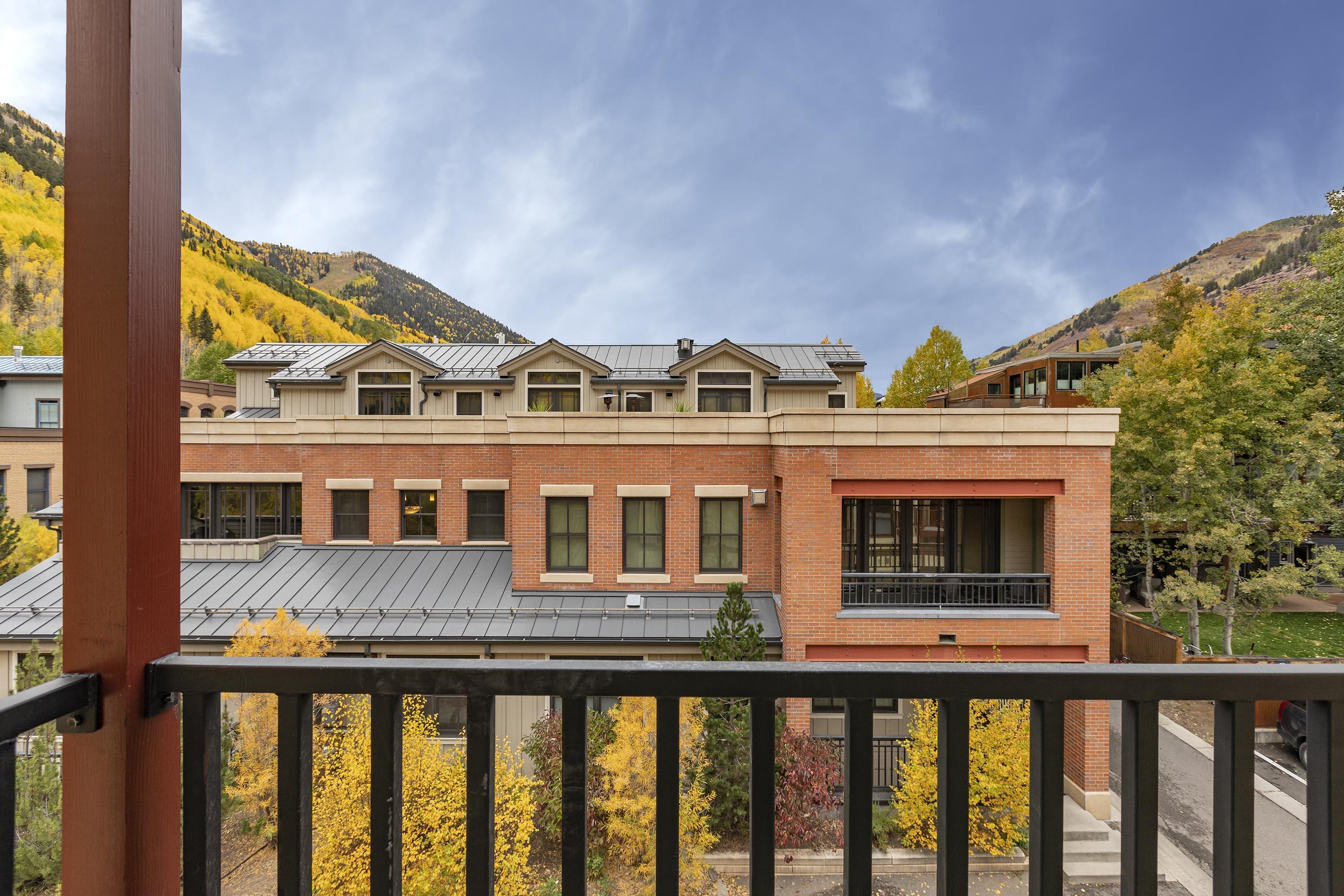 259 South Spruce Street, Unit BC Telluride, CO 81435 - Photo 23 of 28 a view of houses with a swimming pool