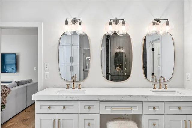 a bathroom with a sink and a shower