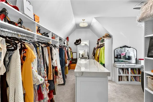 a bathroom with a bathtub and a window