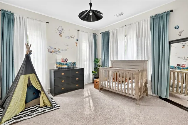 a kitchen with a sink and a stove top oven