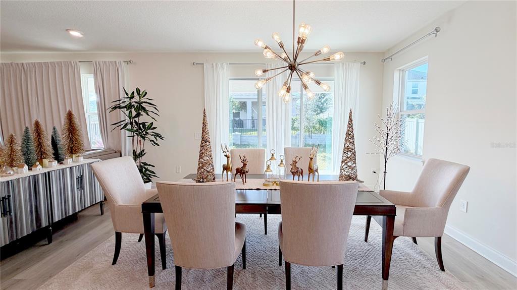 727 Annabell Rdg Road Minneola, FL 34715 - Photo 29 of 56 a view of a dining room with furniture window and outside view