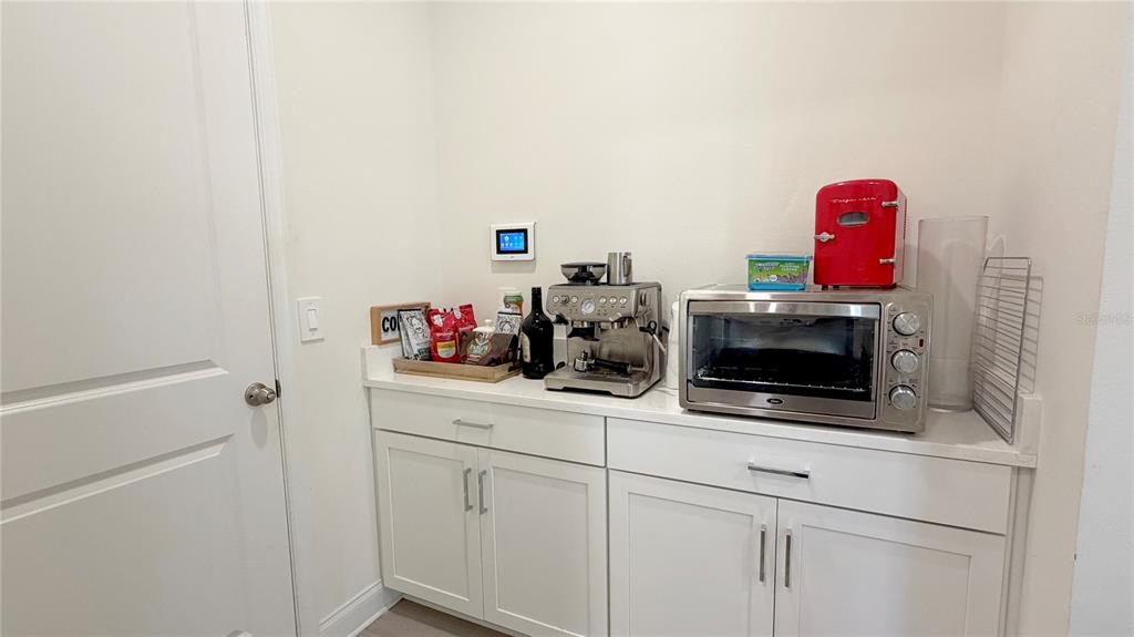 727 Annabell Rdg Road Minneola, FL 34715 - Photo 42 of 56 a room with storage and utility