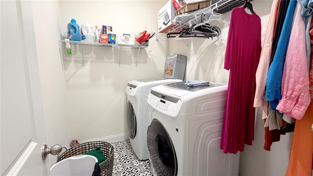 727 Annabell Rdg Road Minneola, FL 34715 - Photo 43 of 56 a utility room with dryer and washer