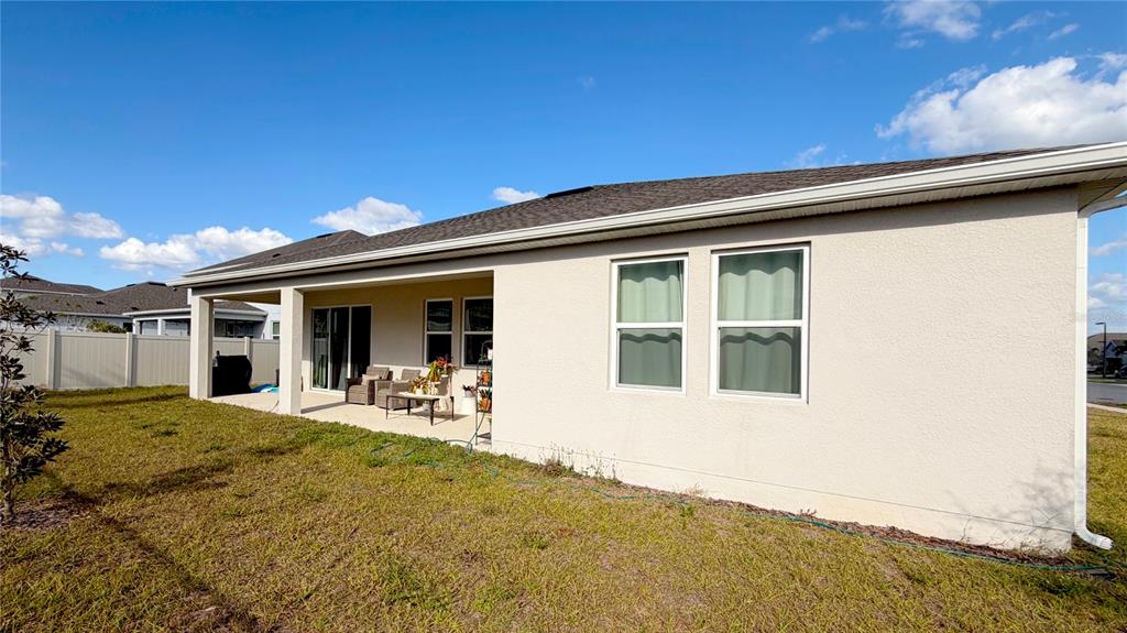 727 Annabell Rdg Road Minneola, FL 34715 - Photo 48 of 56 a front view of a house with a patio