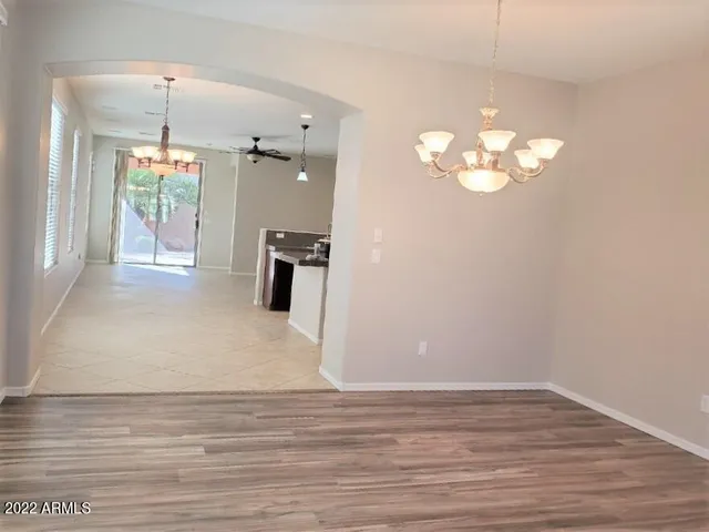 a view of a room with a flat screen tv